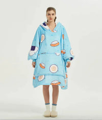 woozies - Person wearing a light blue hoodie with cartoon designs on a white background